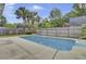 Inviting in-ground swimming pool surrounded by a concrete patio, creating an ideal outdoor leisure space at 8774 Adaline St, North Charleston, SC 29406