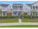 Charming two-story home with a welcoming front porch and second story balcony at 886 Clay Field Trl, Summerville, SC 29485