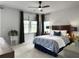 Comfortable bedroom featuring natural lighting and neutral tones with wood bed frame at 886 Clay Field Trl, Summerville, SC 29485