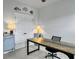 Bright home office space with a modern style desk, neutral walls and a ceiling fan at 886 Clay Field Trl, Summerville, SC 29485