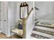 Staircase with wooden treads, white risers and decorative patterned treads at 886 Clay Field Trl, Summerville, SC 29485