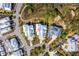 Aerial view of property showcasing modern homes with manicured lawns and landscaping in a well-planned neighborhood at 9822 Haven Loop, Johns Island, SC 29455
