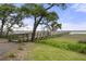 Picturesque dock surrounded by lush greenery, offering a tranquil escape and stunning views of the waterfront at 9822 Haven Loop, Johns Island, SC 29455