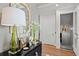 Chic entryway with decorative mirror, table, and vase, creating a stylish welcome to the home at 9822 Haven Loop, Johns Island, SC 29455