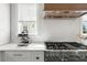 Modern kitchen features stainless steel espresso machine and a range at 9822 Haven Loop, Johns Island, SC 29455