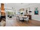 Bright, open living space with hardwood floors, stylish furniture and decor, and abundant natural light at 9822 Haven Loop, Johns Island, SC 29455