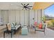 Stylish outdoor living area featuring comfortable seating, ceiling fan and a beautiful ceiling at 9822 Haven Loop, Johns Island, SC 29455