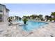 Beautiful pool area with lounge chairs and manicured landscaping at 9822 Haven Loop, Johns Island, SC 29455