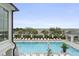 Expansive pool area with lounge chairs overlooking scenic waterway at 9822 Haven Loop, Johns Island, SC 29455