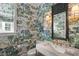 Charming powder room with scenic wallpaper, marble vanity, and brass fixtures adding character and style at 9822 Haven Loop, Johns Island, SC 29455