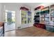 Organized storage room featuring built-in shelving and clear storage containers for easy access at 9822 Haven Loop, Johns Island, SC 29455
