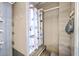 Functional bathroom with shower featuring patterned curtains and neutral wall tones at 100 Canal Rd, Saint George, SC 29477