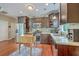 Kitchen with stainless appliances, dark cabinets, and eat-in area, lots of counterspace at 100 Canal Rd, Saint George, SC 29477