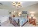 Comfortable bedroom with carpet, ceiling fan, and a window that offers a view at 100 Canal Rd, Saint George, SC 29477
