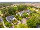 Aerial view of homes, streets, and lush landscape in neighborhood at 11 Dalton St, Daniel Island, SC 29492