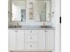 Elegant bathroom featuring white cabinetry, marble countertop, double sinks, and stylish lighting at 11 Dalton St, Daniel Island, SC 29492