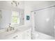 Bright, clean bathroom with white subway tile and a sink with elegant fixtures at 11 Dalton St, Daniel Island, SC 29492