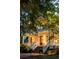 Charming front porch with ceiling fans, comfortable seating, and exterior lighting at 11 Dalton St, Daniel Island, SC 29492