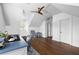 Bright home office featuring hardwood floors, white walls, and a comfortable work area at 11 Dalton St, Daniel Island, SC 29492