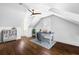 Bright home office with desk, wood floors, and a ceiling fan, perfect for remote work at 11 Dalton St, Daniel Island, SC 29492