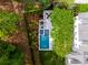 Aerial view of backyard with a pool, patio, and landscaping at 11 Dalton St, Daniel Island, SC 29492
