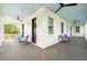 Expansive porch with ample seating and serene views, ideal for outdoor relaxation and entertaining at 11 Dalton St, Daniel Island, SC 29492