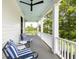Relaxing porch with comfortable seating, a light blue ceiling, and views of the surrounding landscape at 11 Dalton St, Daniel Island, SC 29492