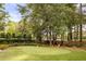 Backyard putting green providing a perfect outdoor space for practicing your short game at 11 Dalton St, Daniel Island, SC 29492