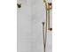 Close up of updated shower showcasing brass fixtures and tile surround at 11 Dalton St, Daniel Island, SC 29492