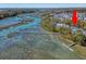 Waterfront home with private dock, set among picturesque waterways, and lush greenery at 1141 Hills Plantation Dr, Charleston, SC 29412