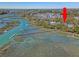 Aerial view of neighborhood, docks, and water showing home's prime location at 1141 Hills Plantation Dr, Charleston, SC 29412