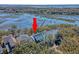 Stunning aerial view of home nestled among lush trees with private waterfront access and serene waterways at 1141 Hills Plantation Dr, Charleston, SC 29412