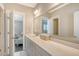 Bathroom featuring gray cabinets, quartz countertop, and neutral colored walls at 1141 Hills Plantation Dr, Charleston, SC 29412