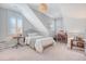 Bedroom with carpeted floors, natural light, and ensuite access to the bathroom at 1141 Hills Plantation Dr, Charleston, SC 29412