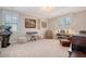 Spacious bedroom with carpeted floors, light walls, and natural light at 1141 Hills Plantation Dr, Charleston, SC 29412