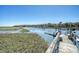 Waterfront view from a private dock, showcasing scenic water views and community landscape at 1141 Hills Plantation Dr, Charleston, SC 29412