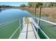 Community dock extending over the water, providing access for boating and water activities at 1141 Hills Plantation Dr, Charleston, SC 29412