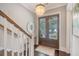 Entryway with hardwood floors and views of the water outside at 1141 Hills Plantation Dr, Charleston, SC 29412