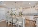 Bright kitchen with white cabinetry, a marble island, pendant lighting, and stainless steel appliances at 1141 Hills Plantation Dr, Charleston, SC 29412