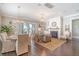 Open living area with dining table, fireplace, and sliding doors to outdoor space with beautiful views at 1141 Hills Plantation Dr, Charleston, SC 29412