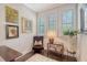 Cozy sitting room featuring natural light, hardwood floors, and decorative art at 1141 Hills Plantation Dr, Charleston, SC 29412