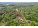 Beautiful aerial view of 65 acre wooded lot with house and long driveway, offering privacy and serenity at 128 Paul Dr, Summerville, SC 29483
