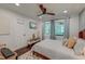 Bright bedroom featuring a queen bed, natural light, a ceiling fan and hardwood floors at 128 Paul Dr, Summerville, SC 29483