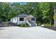 Charming home featuring a manicured front yard, newly painted exterior, and ample parking at 128 Paul Dr, Summerville, SC 29483
