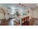 Modern kitchen with white cabinets, stainless steel appliances, a center island, and stylish pendant lighting at 128 Paul Dr, Summerville, SC 29483
