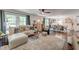 Cozy living room features hardwood floors, lots of light, and an open layout at 128 Paul Dr, Summerville, SC 29483