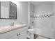 A clean bathroom offers a tub, shower, vanity, and light tiling with a neutral color palette at 130 River Landing Dr # 4102, Charleston, SC 29492