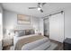 Stylishly furnished bedroom boasts a comfortable bed, accent painting, and modern decor with hardwood floors at 130 River Landing Dr # 4102, Charleston, SC 29492