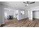 Open-concept living space with a dining area, adjacent kitchen, and views of a doorway at 130 River Landing Dr # 4102, Charleston, SC 29492