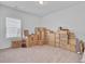 Bedroom corner filled with moving boxes in an empty room at 134 Percheron Dr, Summerville, SC 29486
